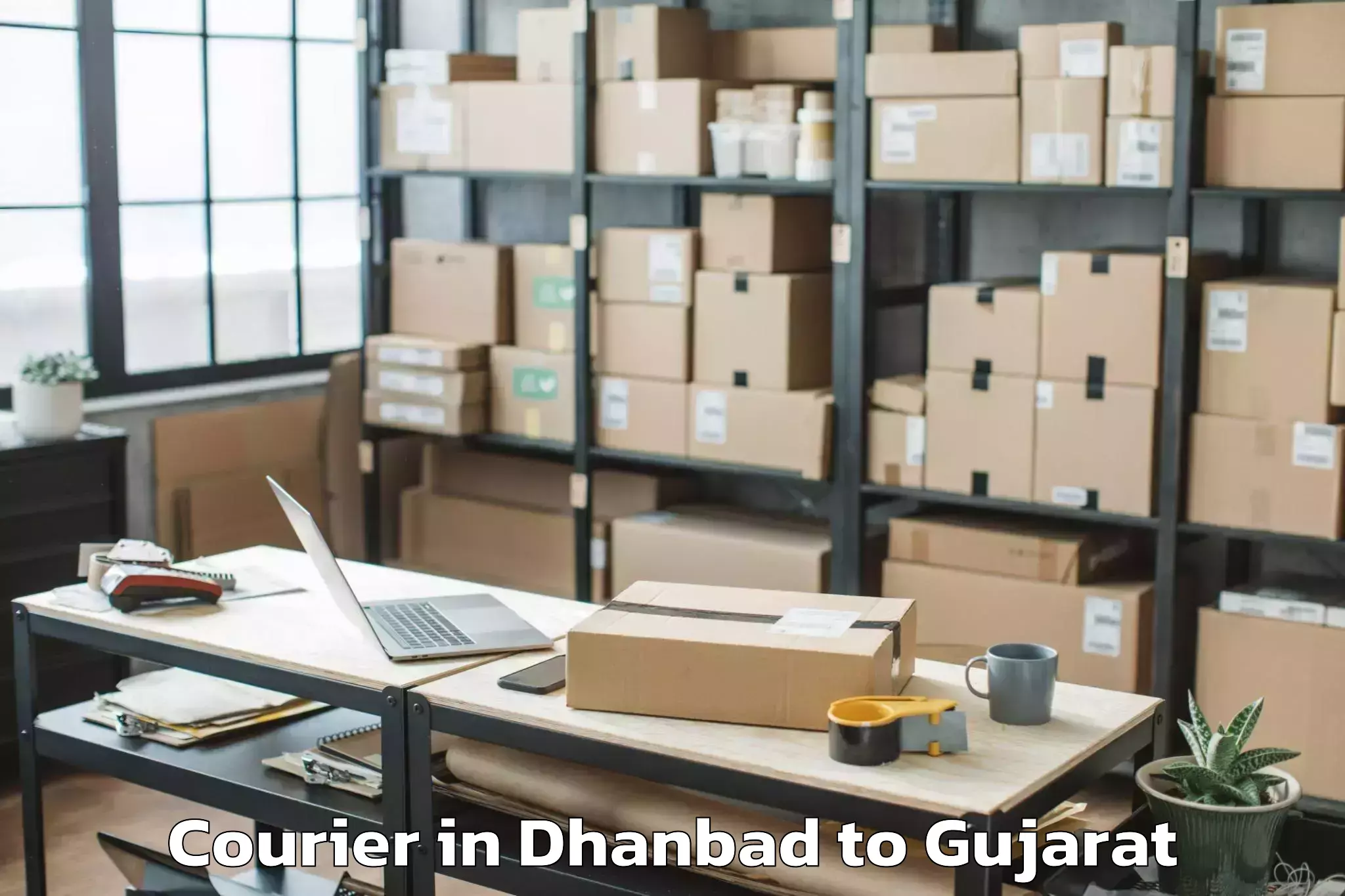 Trusted Dhanbad to Mahudha Courier